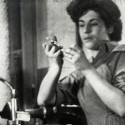 Photo: Thelma Estrin working on a piece of engineering equipment
