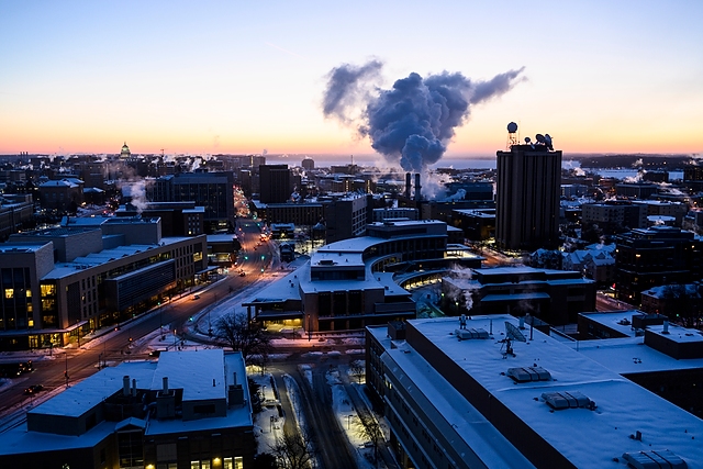 Photo: Steam rises in the air on a cold dawn on campus.