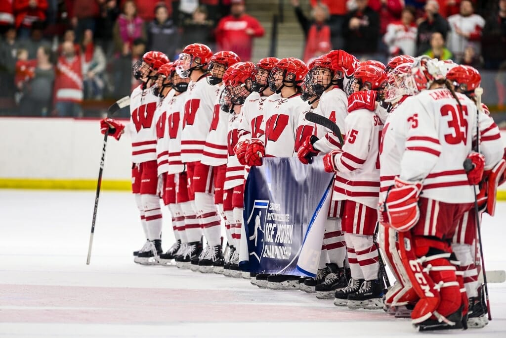 The Badgers celebrate celebrate their 4-0 victory over the Syracuse Orange to advance to the NCAA frozen four.