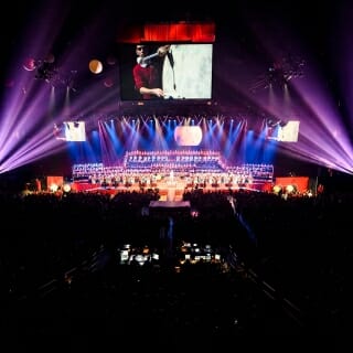 Photo: A shot of the stage and the audience during the concert.
