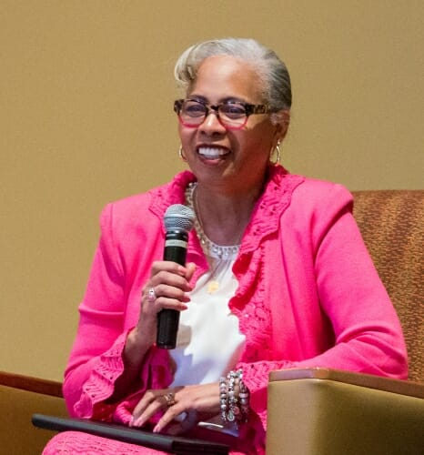 Photo: Ladson-Billings seated speaking into microphone