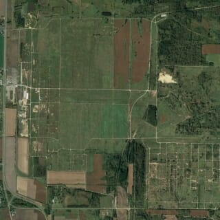 An aerial photo of a largely empty plot of land
