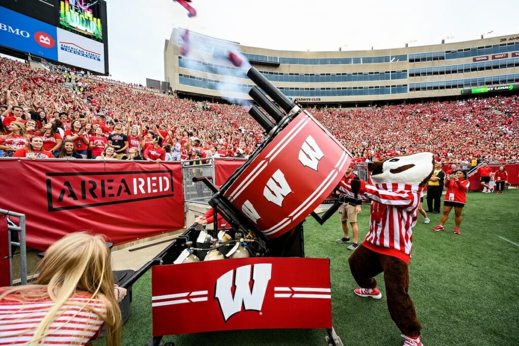 Photo: Bucky Badger fires a t-shirt cannon at Camp Randall Stadium.