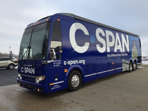 Photo: Blue bus with "C-SPAN" sign on it