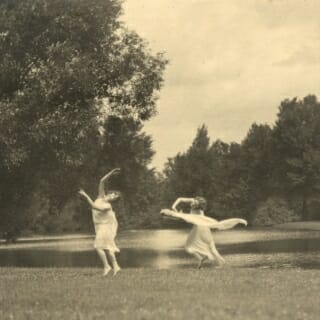 Two of Margaret H’Doubler’s students dancing lakeside, circa 1920s.