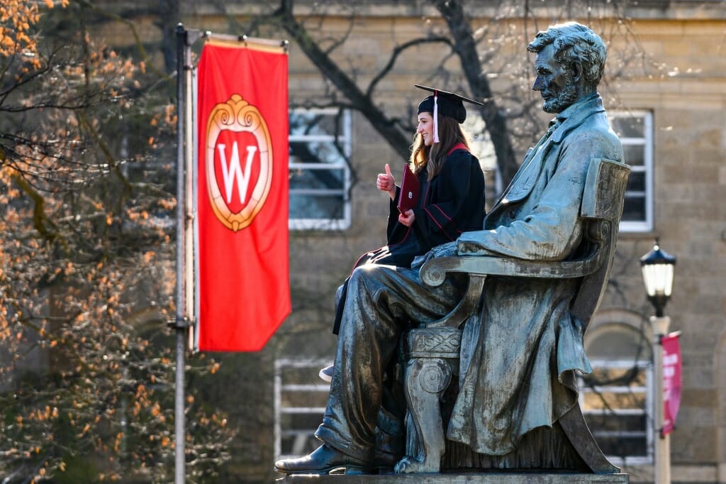 It's become a tradition for graduates to pose for photos on the lap of Abe Lincoln.