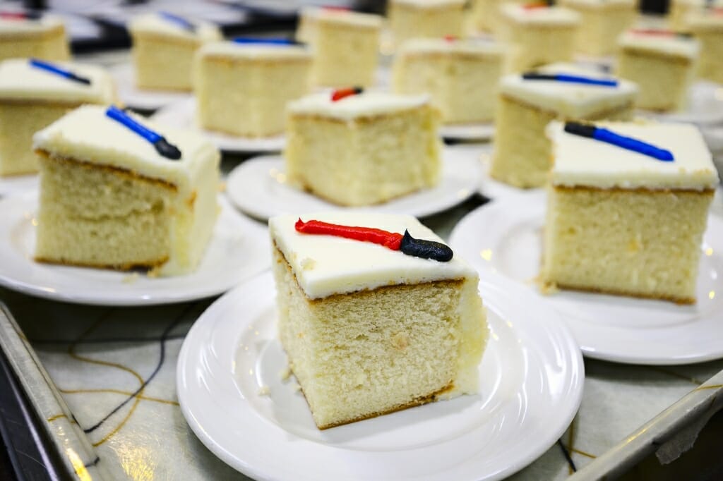 Slices of cake with light saber-styled icing help put students in the proper Star Wars mood.