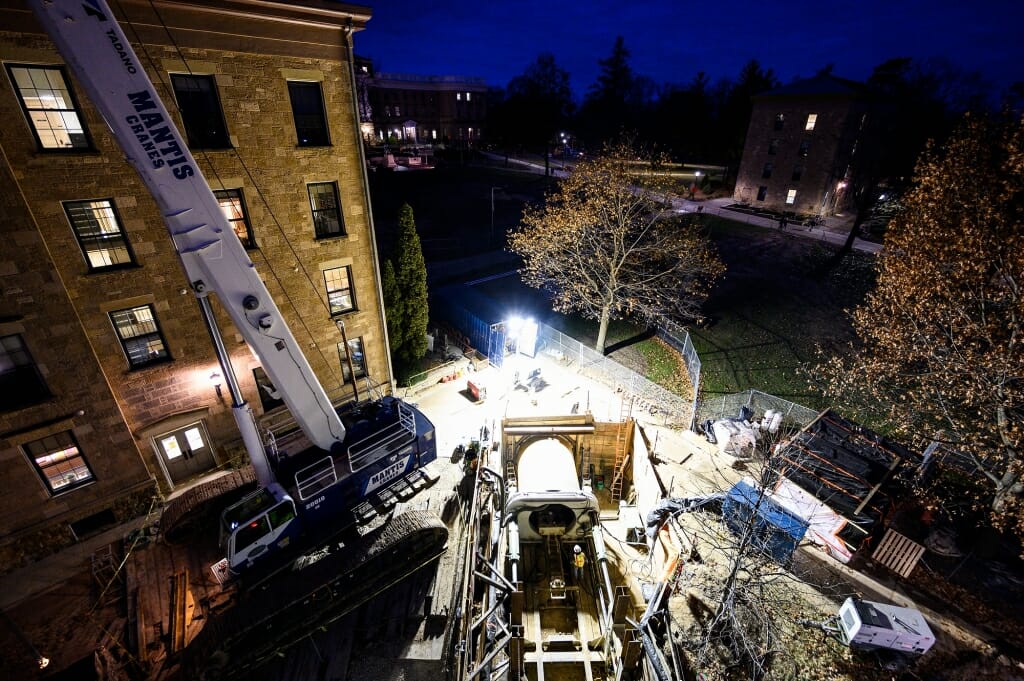 Photo: An overall view of the tunnel construction site under the lights.