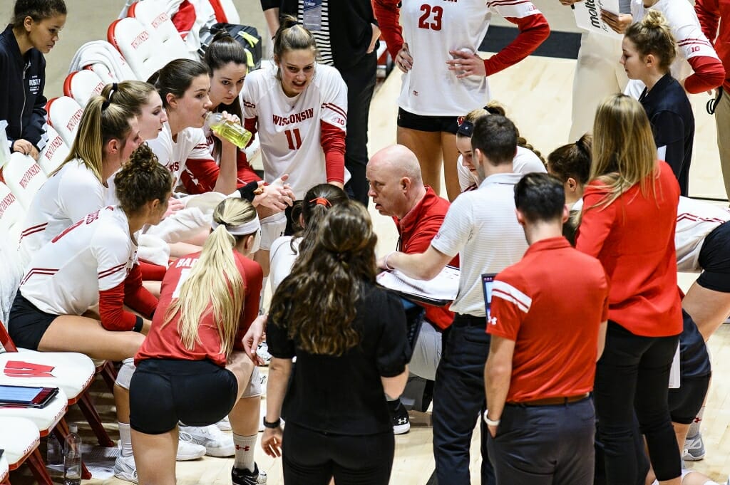 Photo: Head coach Kelly Sheffield talks with the team during a time out.