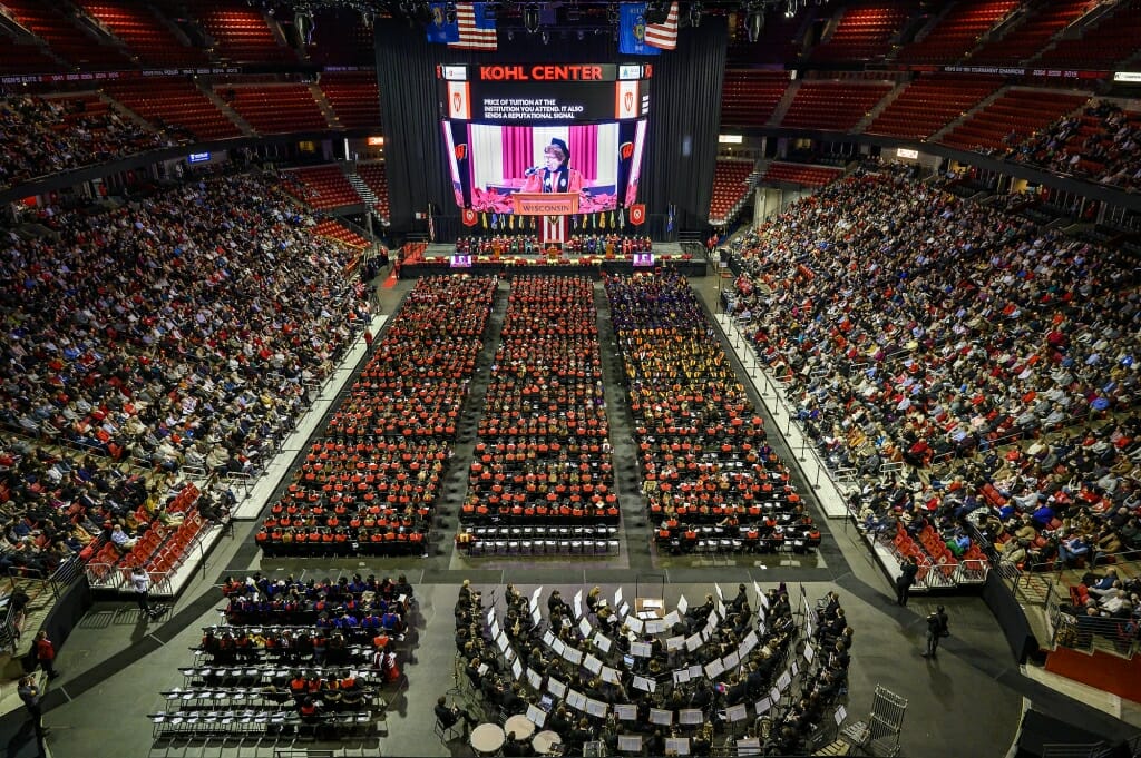 Aerial view of the Kohl Center showing the graduates and audience.