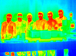 Photo: Lab members faces in red, table in blue