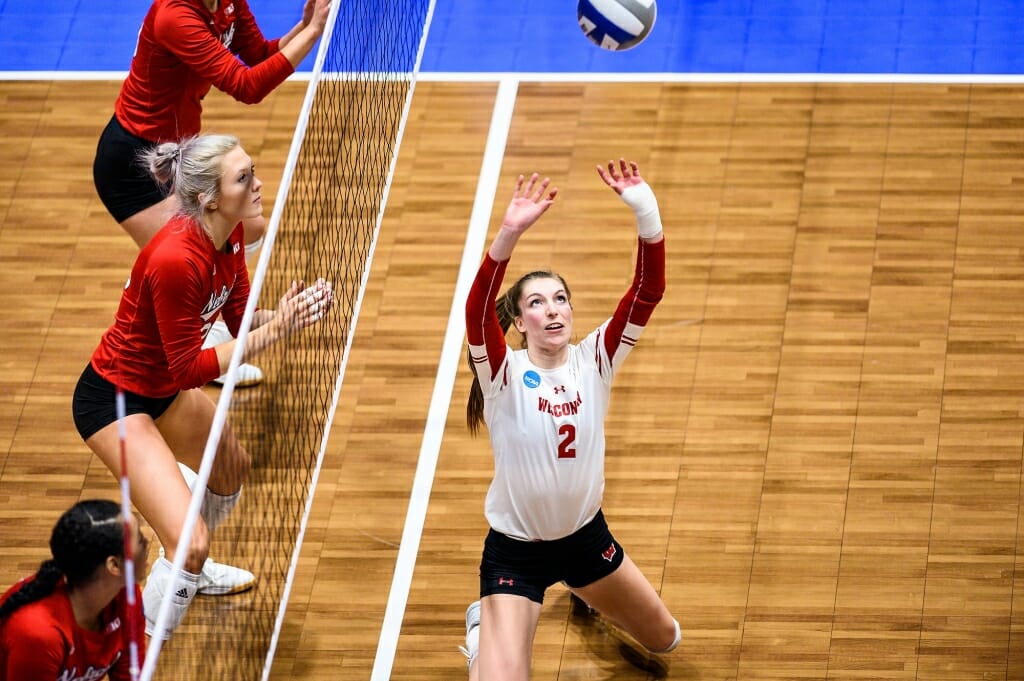 Wisconsin setter Sydney Hill (2) sets the ball.