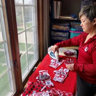 One Badger mom works all day making UW-themed face masks. 