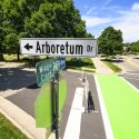 Arboretum Drive street sign at intersection with bike trail