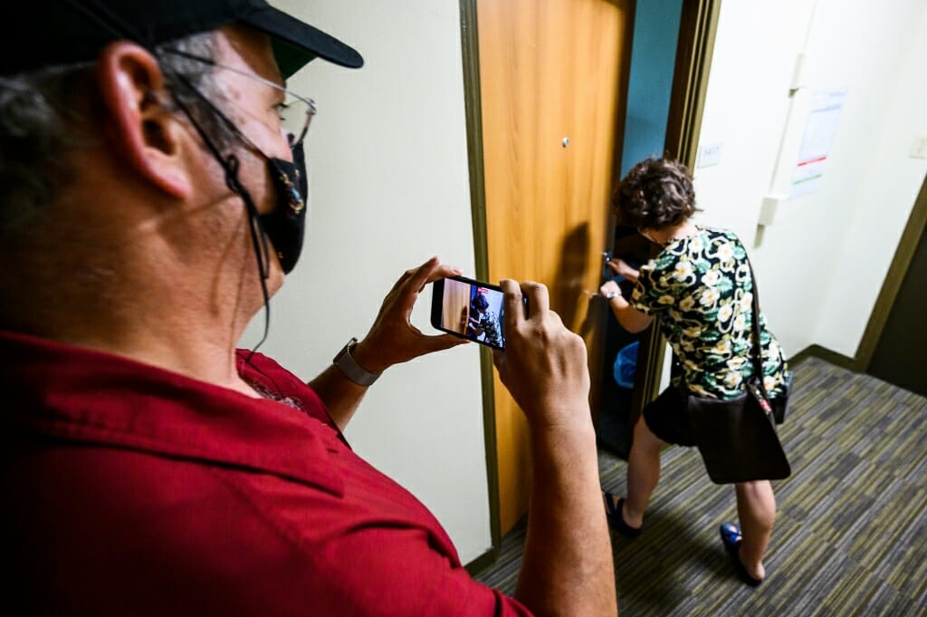 Todd Rosenberg records the moment his daughter Bella first opens her room door at Elizabeth Waters Residence Hall.