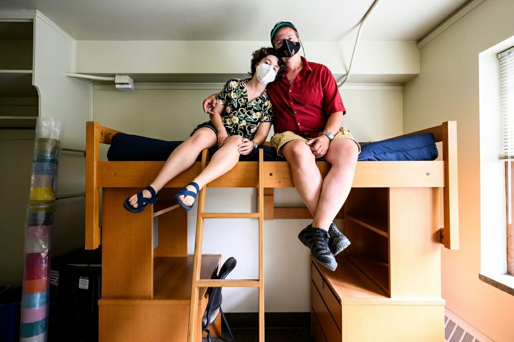 With the loft successfully built, Todd Rosenberg and his daughter Bella pose for photos on it.