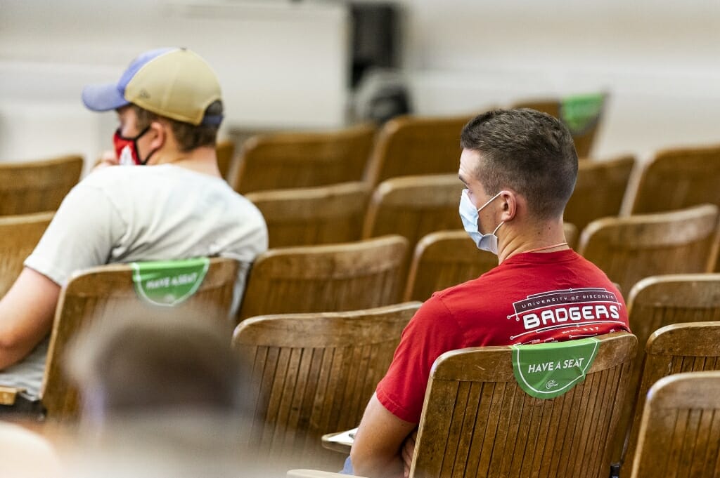 Students listen during an in-person classroom lecture in Agricultural Hall.