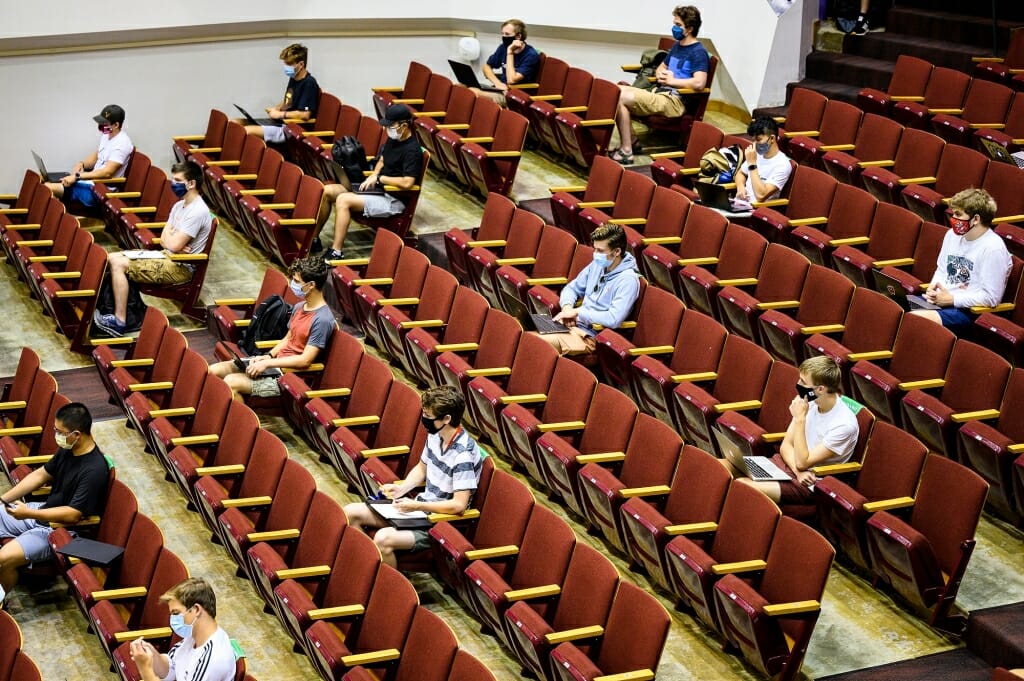 Students wear face masks and sit physically-distanced during a computer science class in the Mosse Humanities Building.
