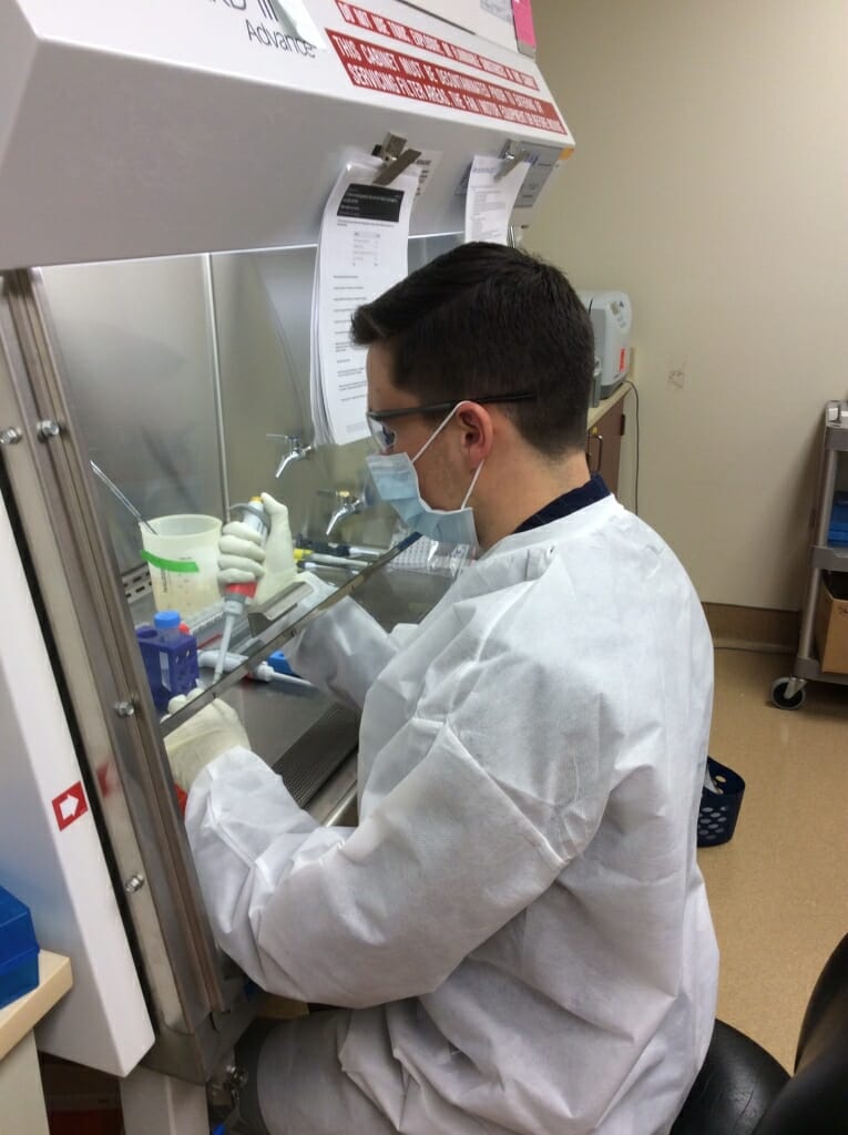 Gage Moreno working in a lab