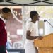 Undergraduates Nyla Mathis (right) and Israel Oby (left) address attendees.