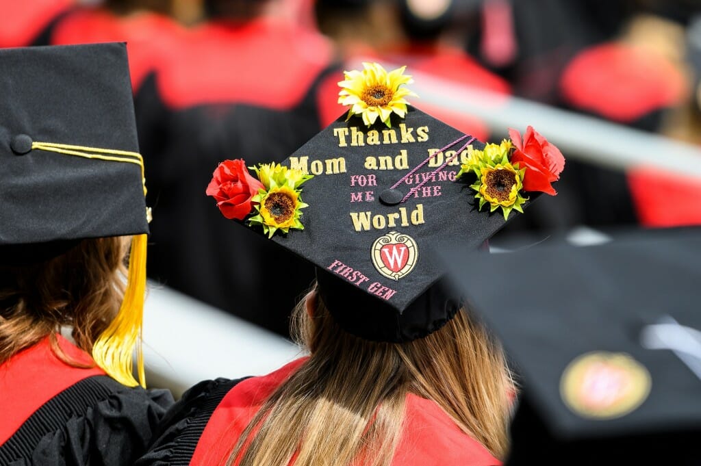 A mortarboard reading "Thanks, Mom and Dad, for giving me the world. First Gen."