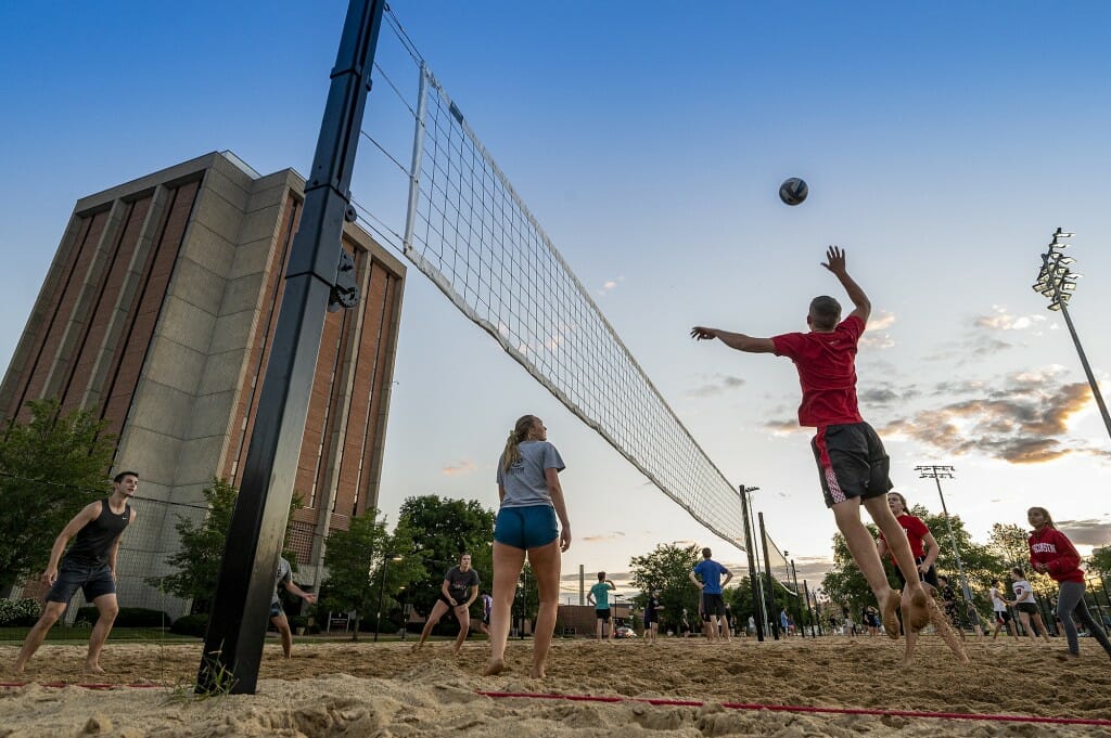 The setting sun provided a pretty backdrop to the volleyball action.