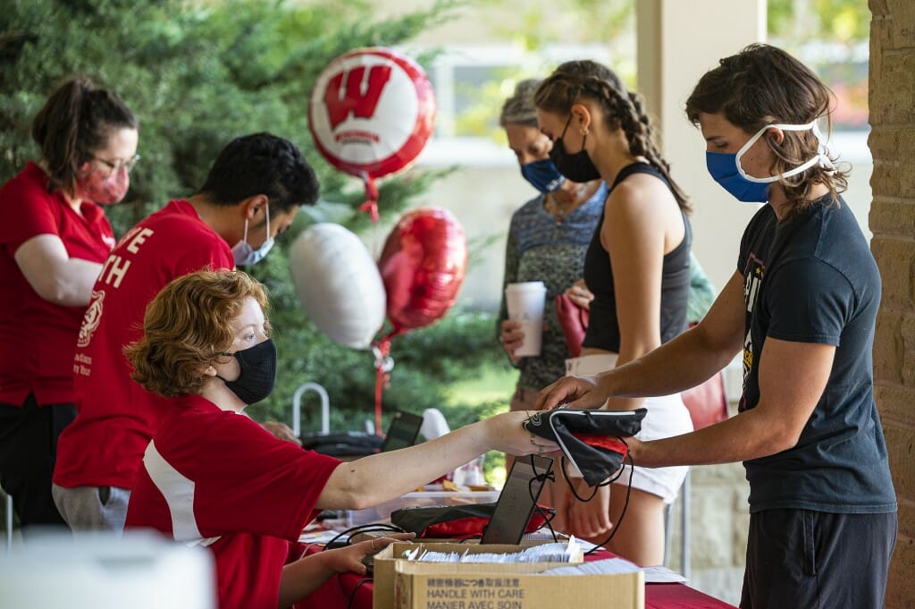 Move-in day is a cause for celebration, as incoming undergraduates check in to a residence hall in University Housing's Lakeshore Neighborhood.