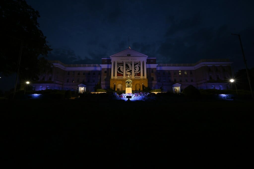 Bascom Hall is lit up in red, white and blue.