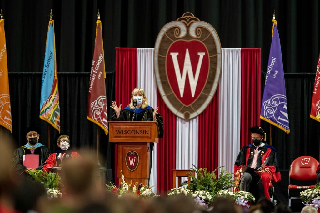 Reesor speaking at podium