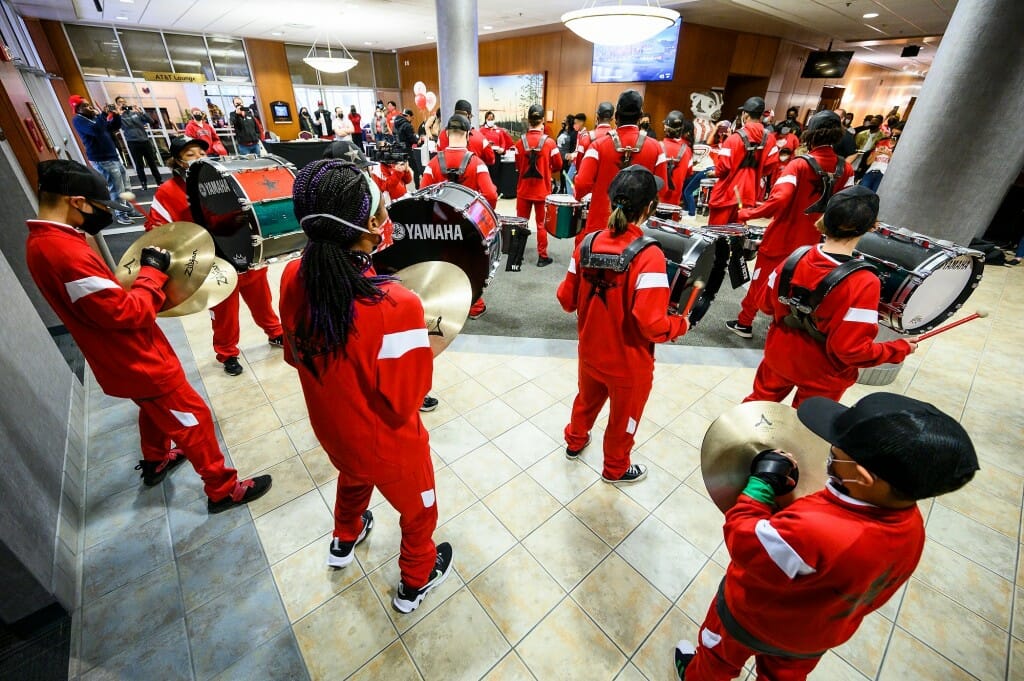 Black Star Drum Line, a local youth performance group, plays some beats for guests during the Multicultural Homecoming Game Watch and Tailgate.