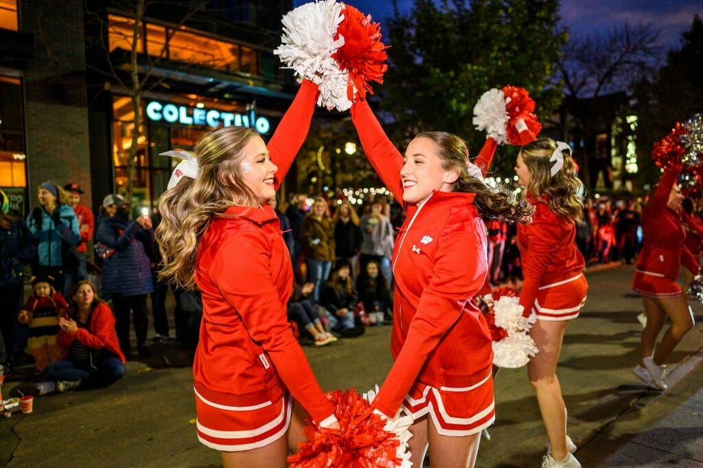 Members of the Spirit Squad dance down State Street during the Homecoming parade.