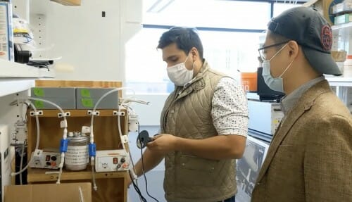 2 guys working in a lab