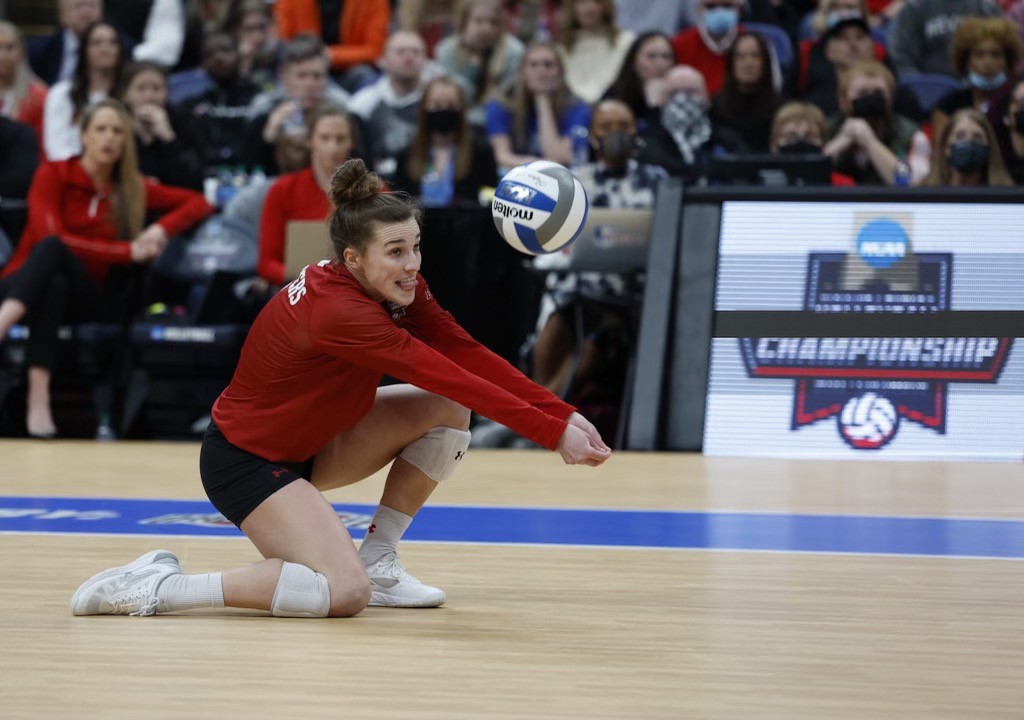 Lauren Barnes makes a dig, keeping the ball in play.