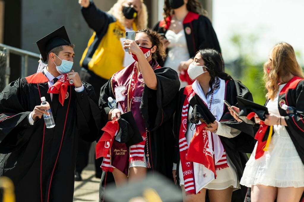 Graduates — but, due to health and safety considerations, not family, friends or visitors — were able to celebrate an almost-traditional spring commencement when the in-person event at Camp Randall Stadium returned from 2020’s pandemic-induced hiatus.