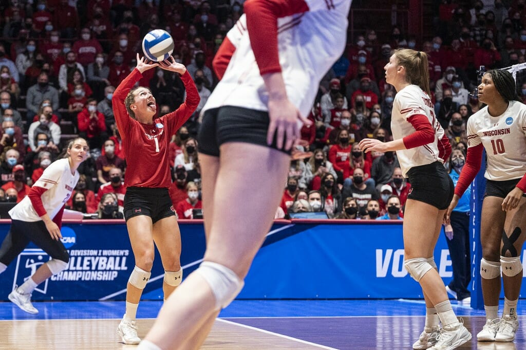 Wisconsin player setting the ball