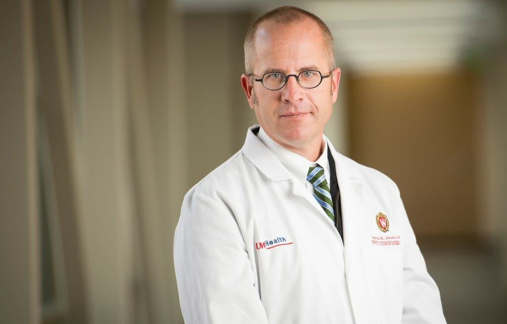 Portrait of David Andes in white lab coat