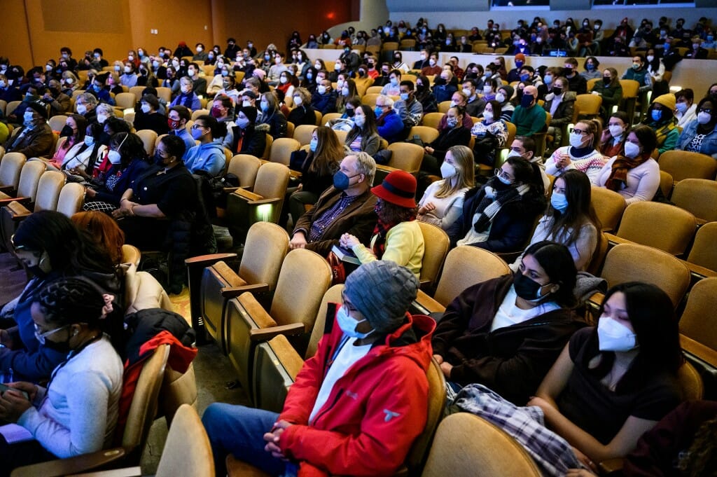 View of auditorium with audience members in their seats