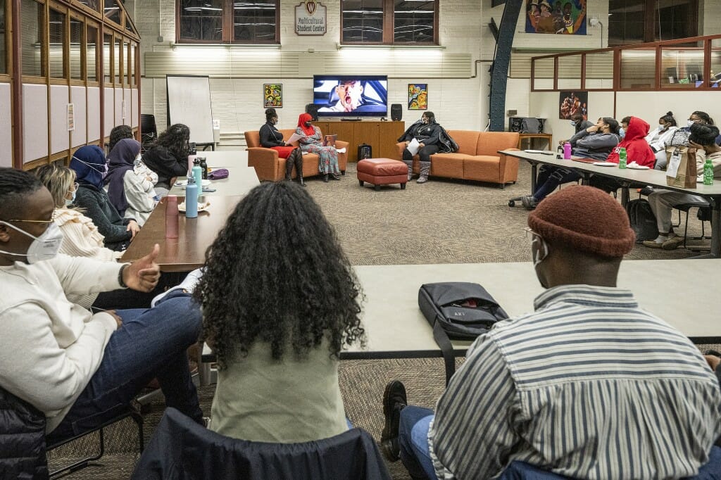 Attendees watch a movie clip before a discussion session during the Soul Talk event.