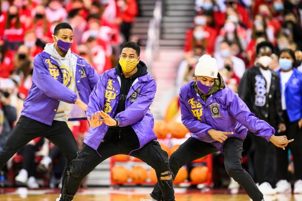 Members of Omega Psi Phi fraternity perform their stroll, a dance of power and unification.