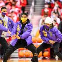 Members of Omega Psi Phi fraternity perform their stroll, a dance of power and unification.