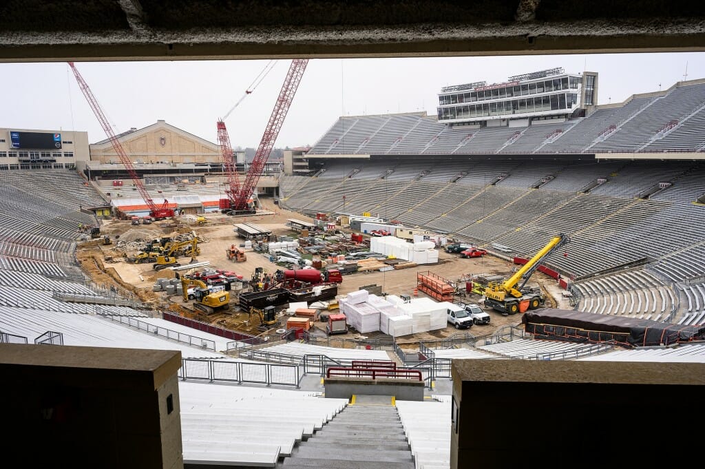 Construction equipment and dirt inside the bowl of Camp Randall