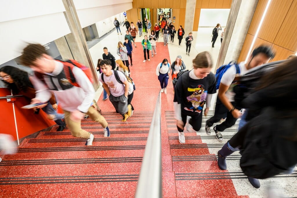 Students climbing stairs