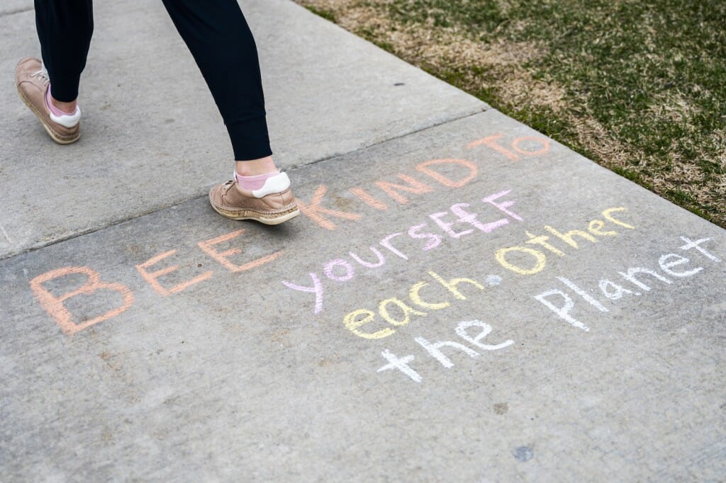 Earth Day-inspired chalk art is pictured outside of the Wisconsin Historical Society.