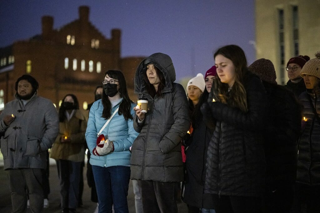 Students and community members attend a vigil for peace in Ukraine on Library Mall.
