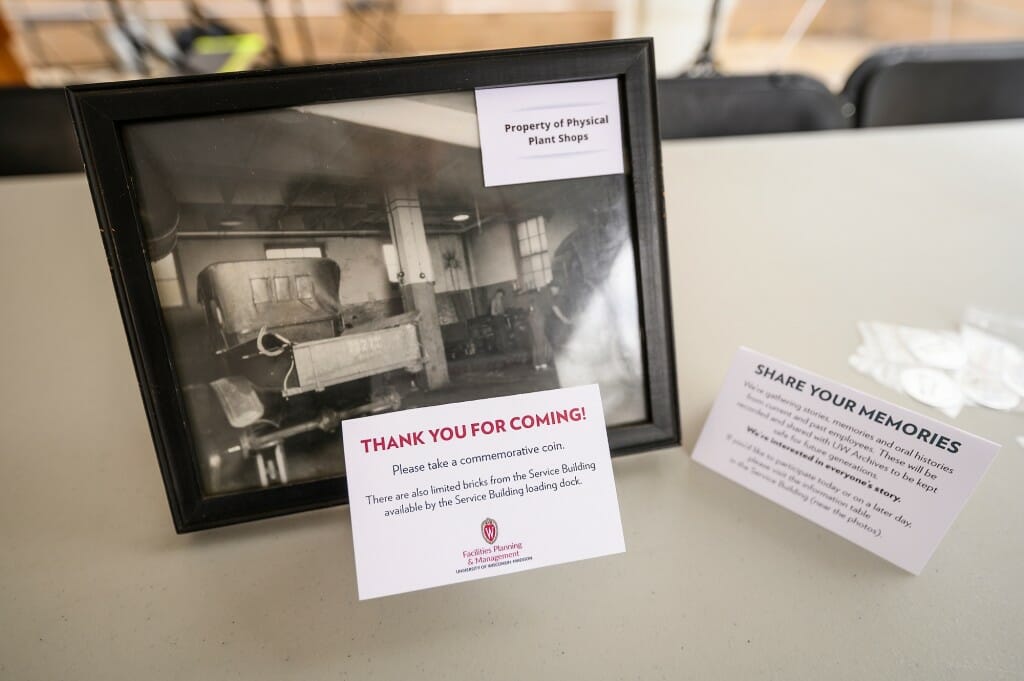 Two signs invite guests to offer oral histories and memories.