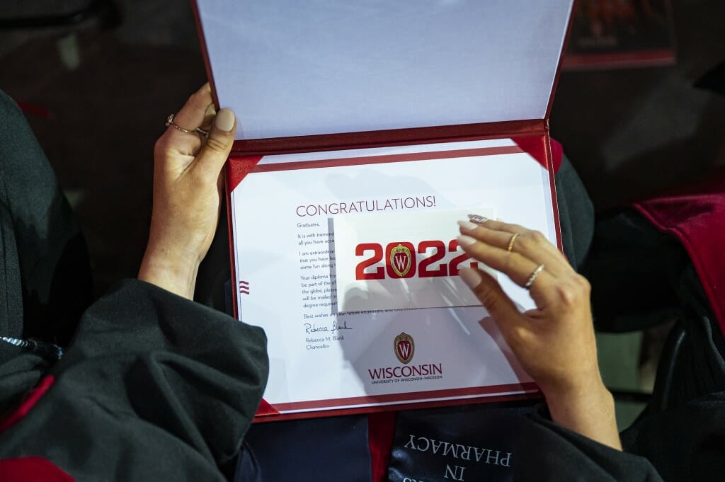 Spoiler alert: The actual diploma will come in the mail, to be inserted in the red covers graduates received at commencement.
