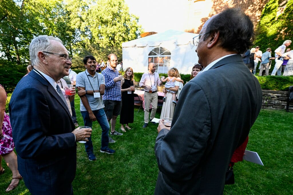 College of Engineering Dean Ian Robertson and Wisconsin School of Business Dean Vallabh Sambamurthy catch up.