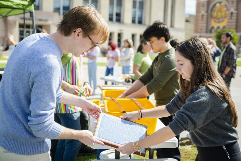 Pulping and screening Students handmake paper on Library Mall