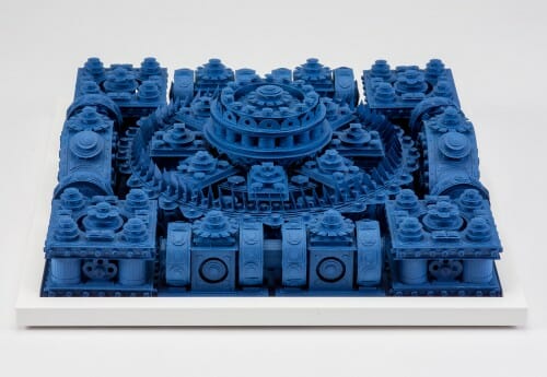 Blue paper sculpture with intricate architectural details by Michael Velliquette