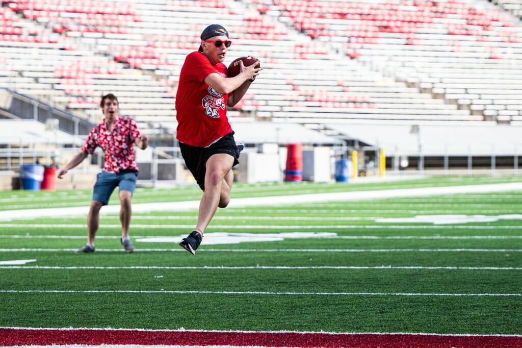 Students participate in a pass/run contest during the W Project.